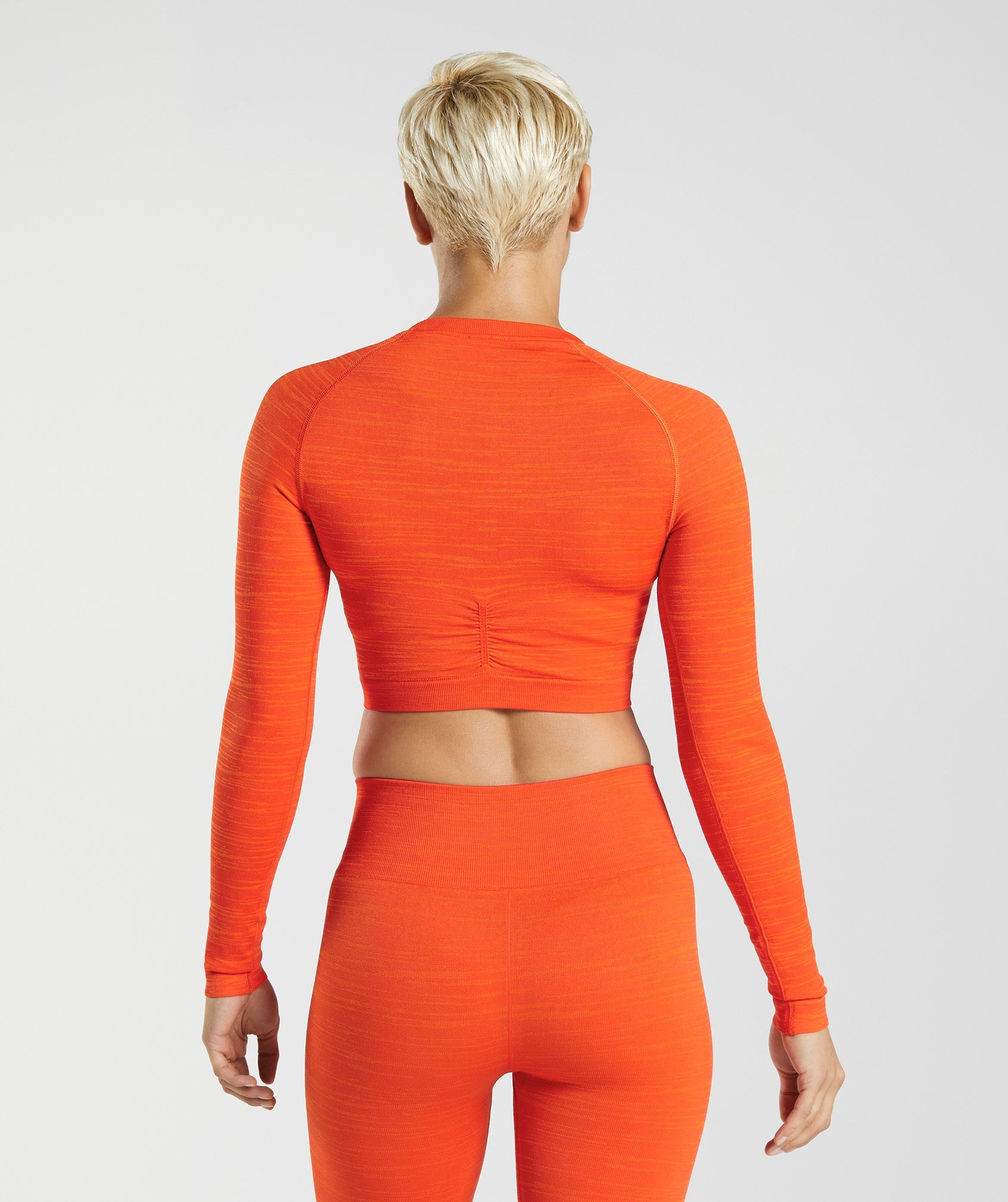 Adapt Marl Seamless Long Sleeve Crop Top in VLT | Pepper Red/Zesty Orange