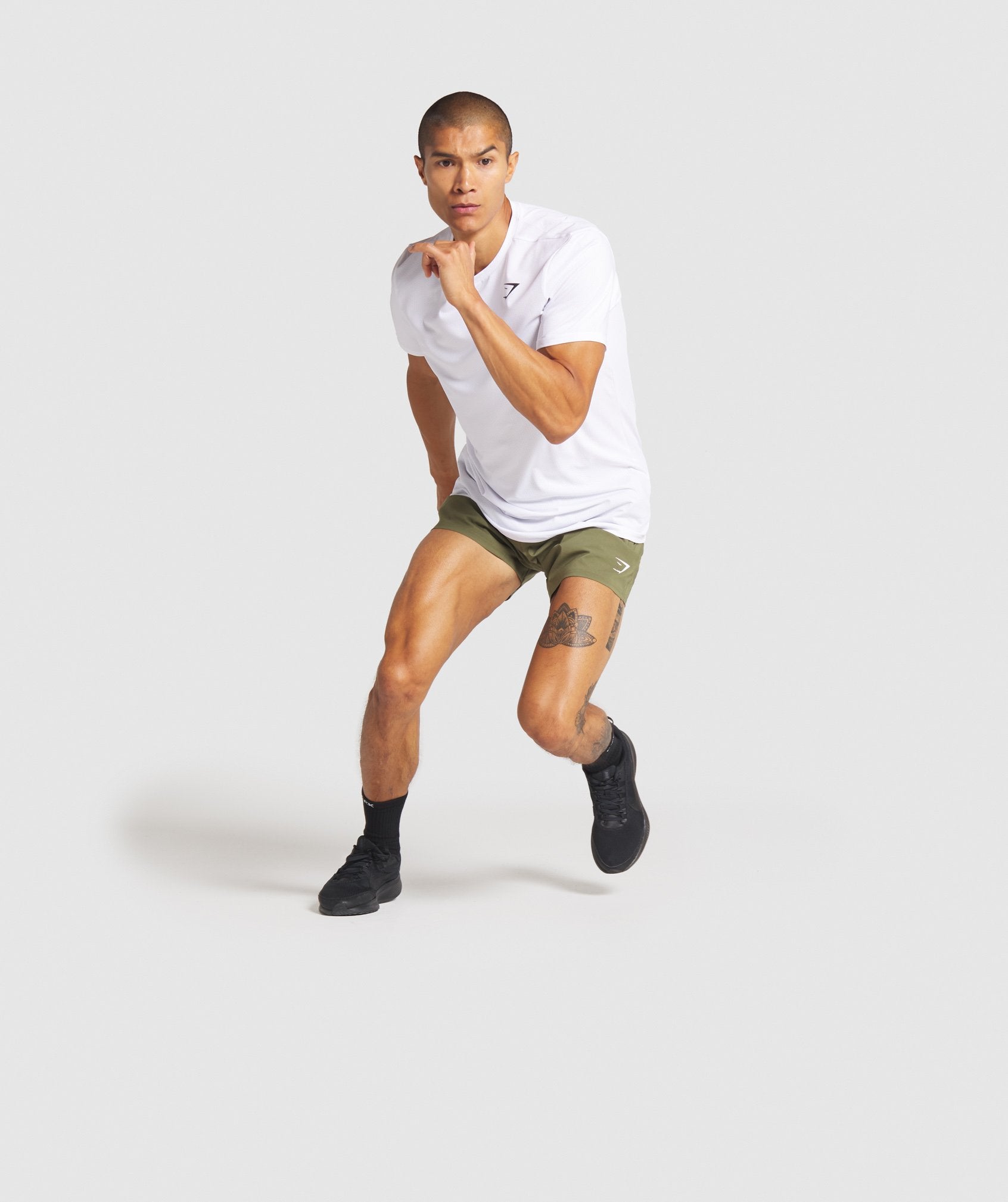 Arrival 5" Zip Pocket Shorts in Dark Green