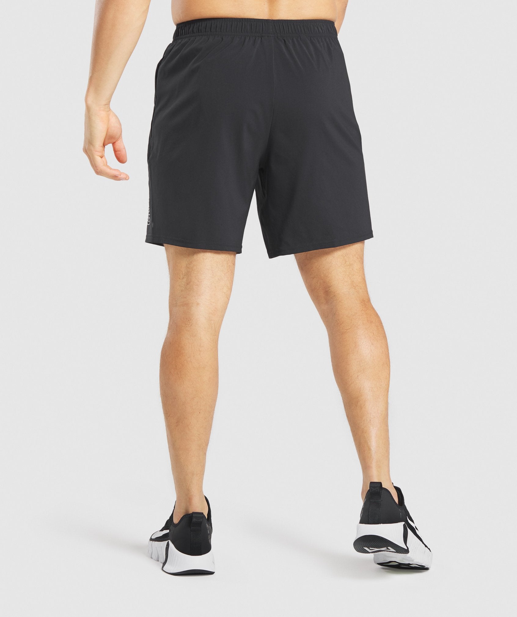 Arrival Graphic Shorts in Black