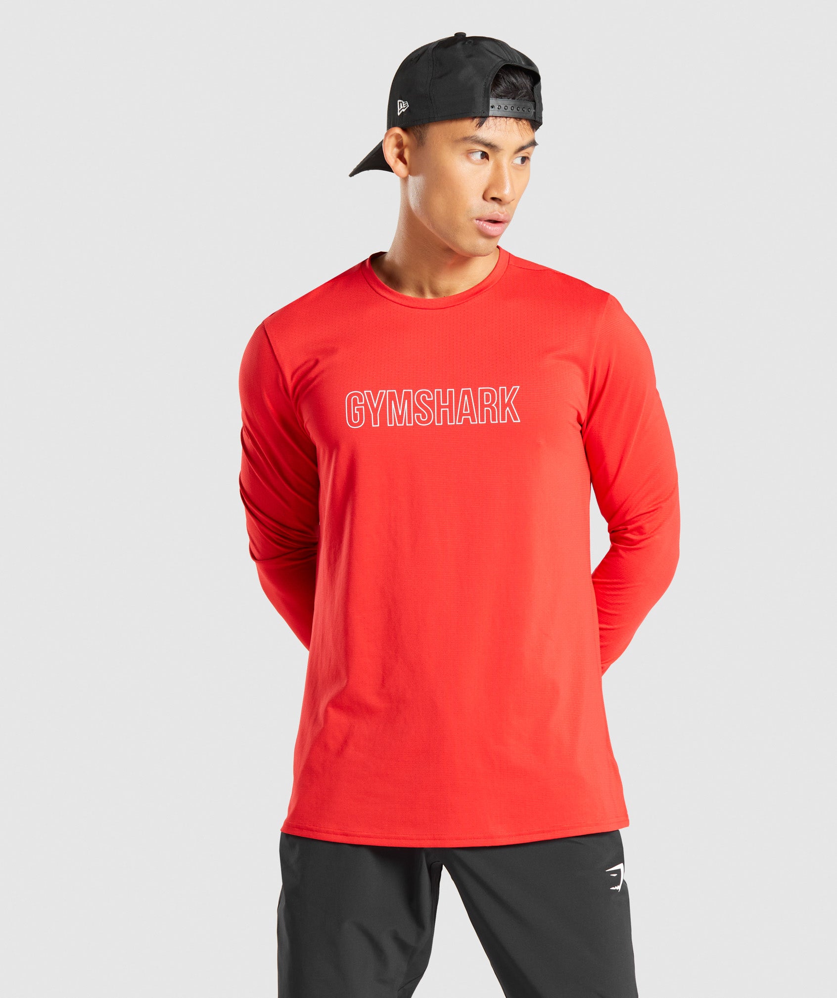 Arrival Long Sleeve Graphic T-Shirt in Red