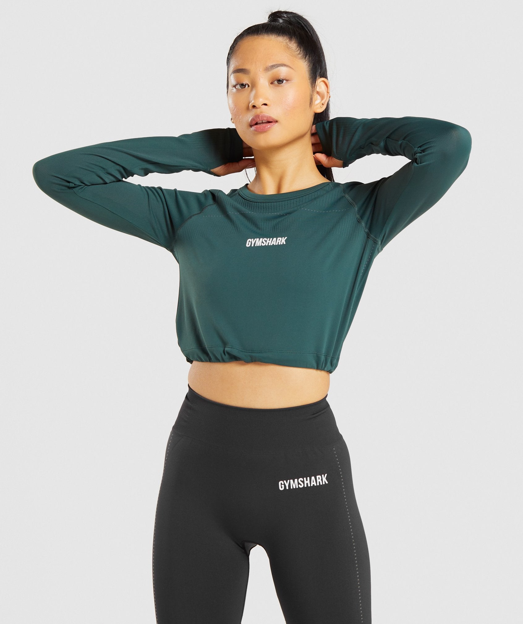 Breeze Lightweight Seamless Long Sleeve Crop Top in Dark Green - view 1