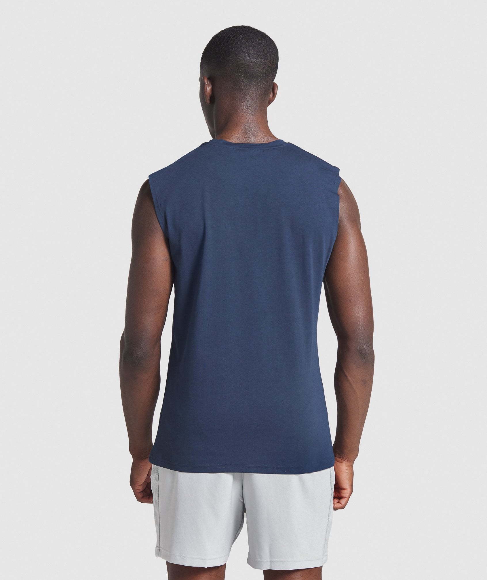 Critical Sleeveless Tee in Navy