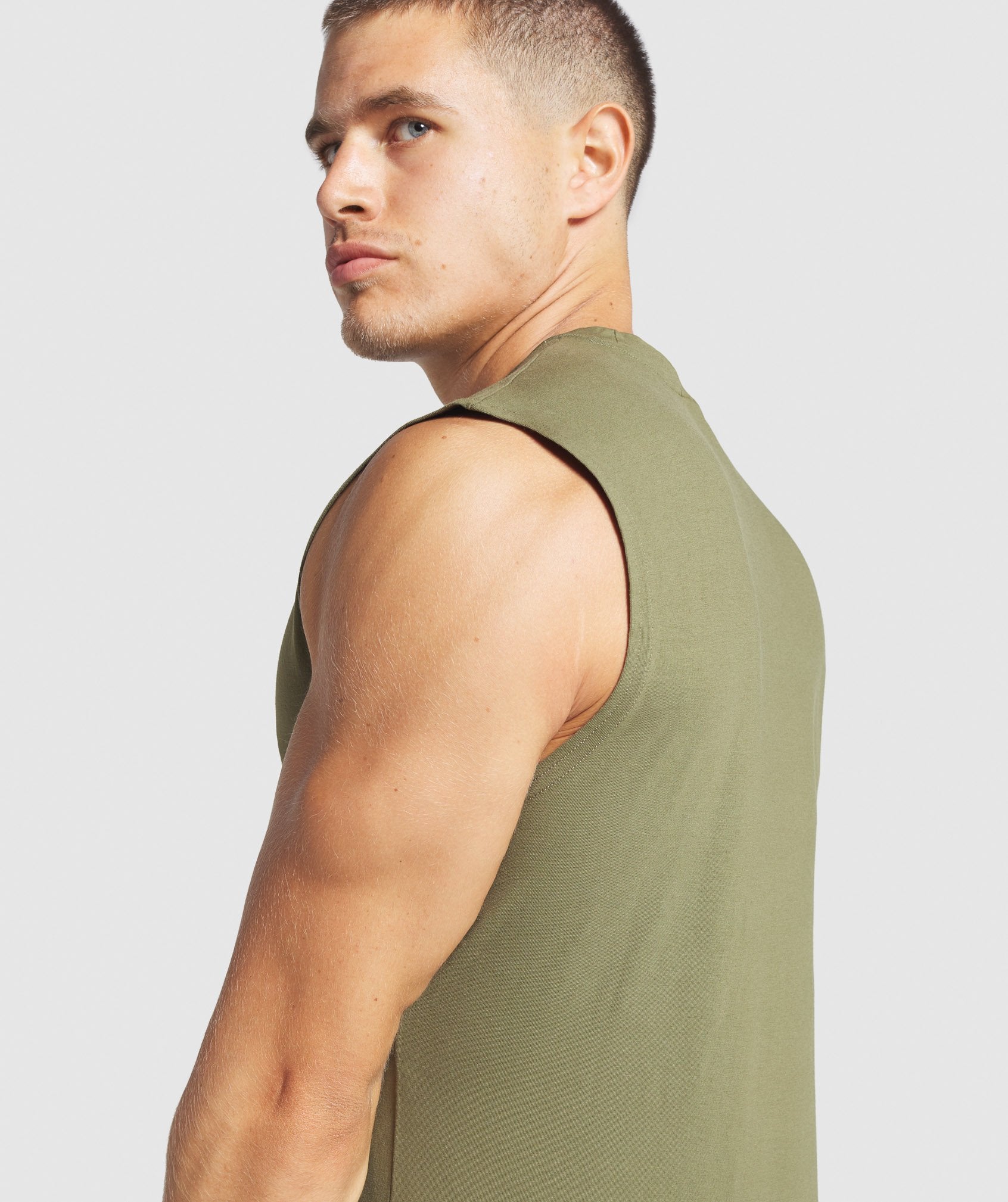 Critical Sleeveless Tee in Dark Green