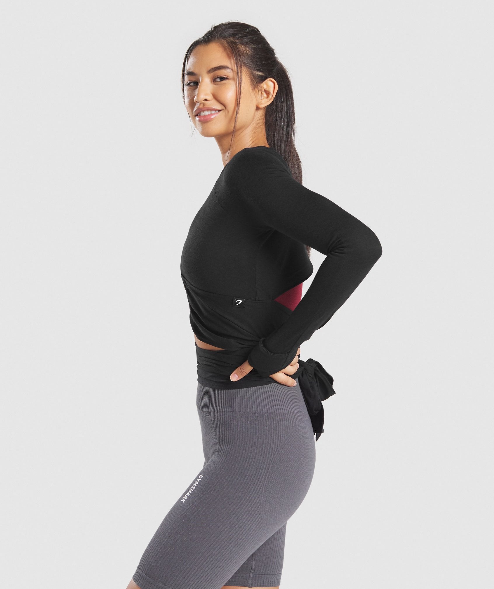 Power Down Long Sleeve Crop Top in  Black