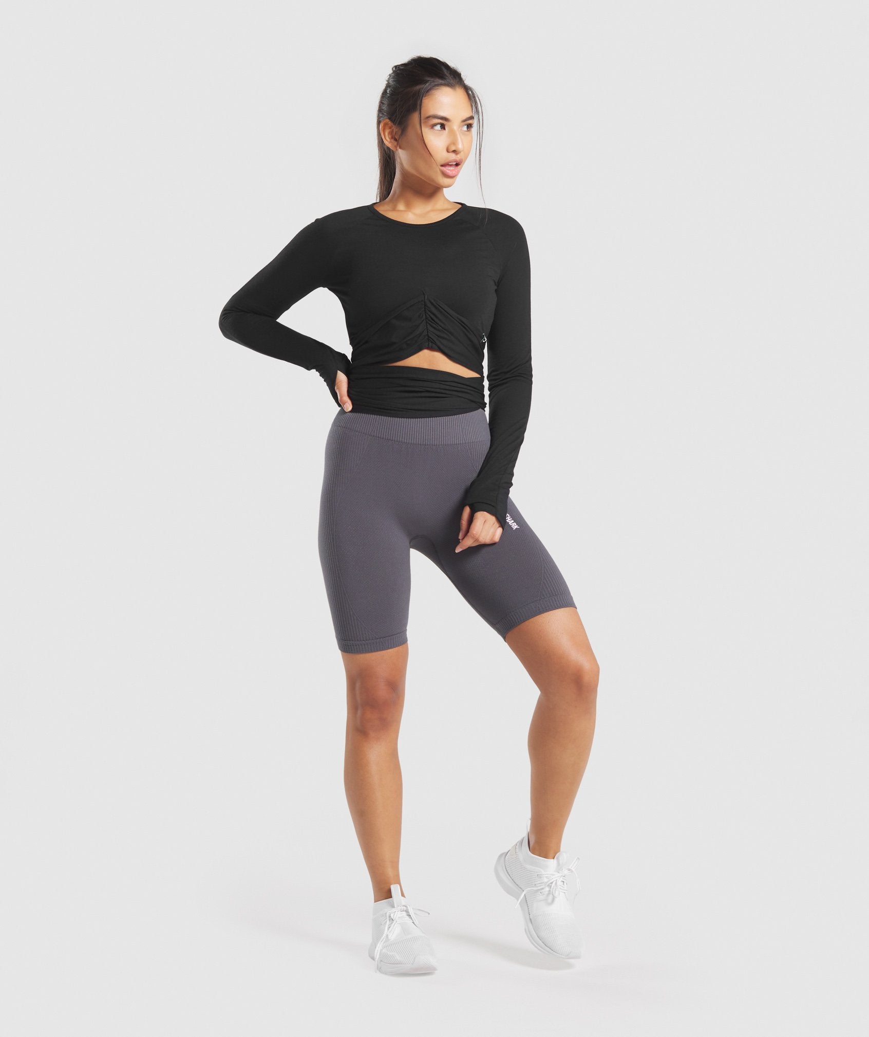 Power Down Long Sleeve Crop Top in  Black