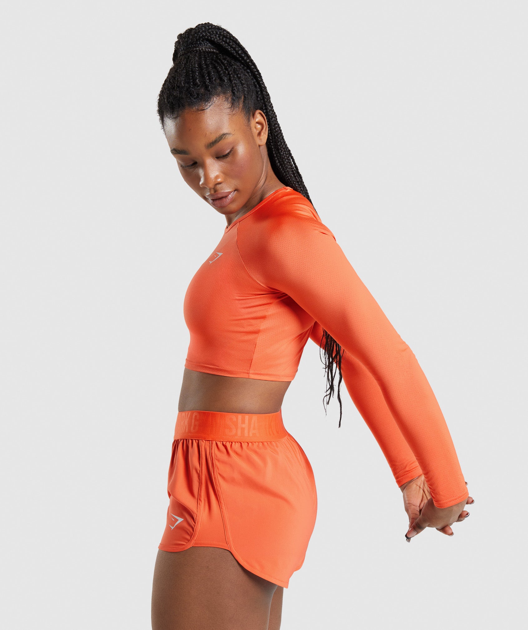 Training Long Sleeve Crop Top in Papaya Orange - view 3