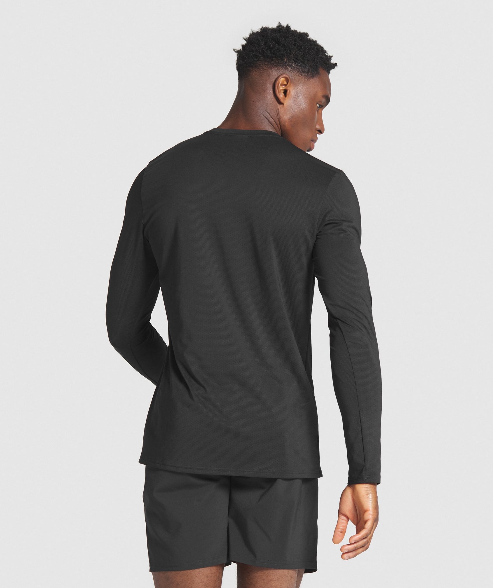 Arrival Long Sleeve Graphic T-Shirt in Black