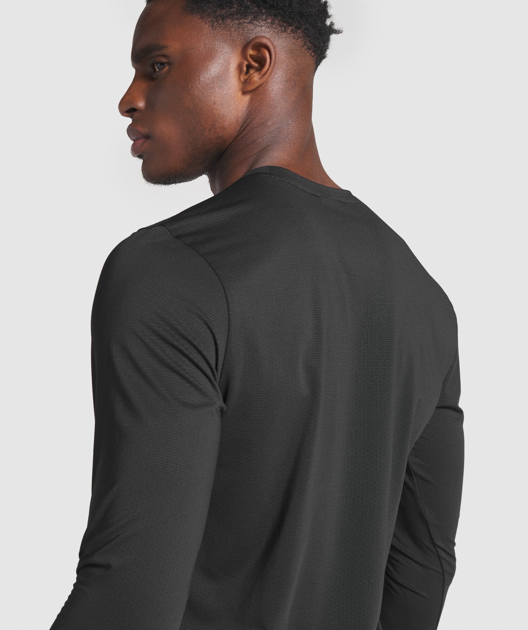 Arrival Long Sleeve Graphic T-Shirt in Black