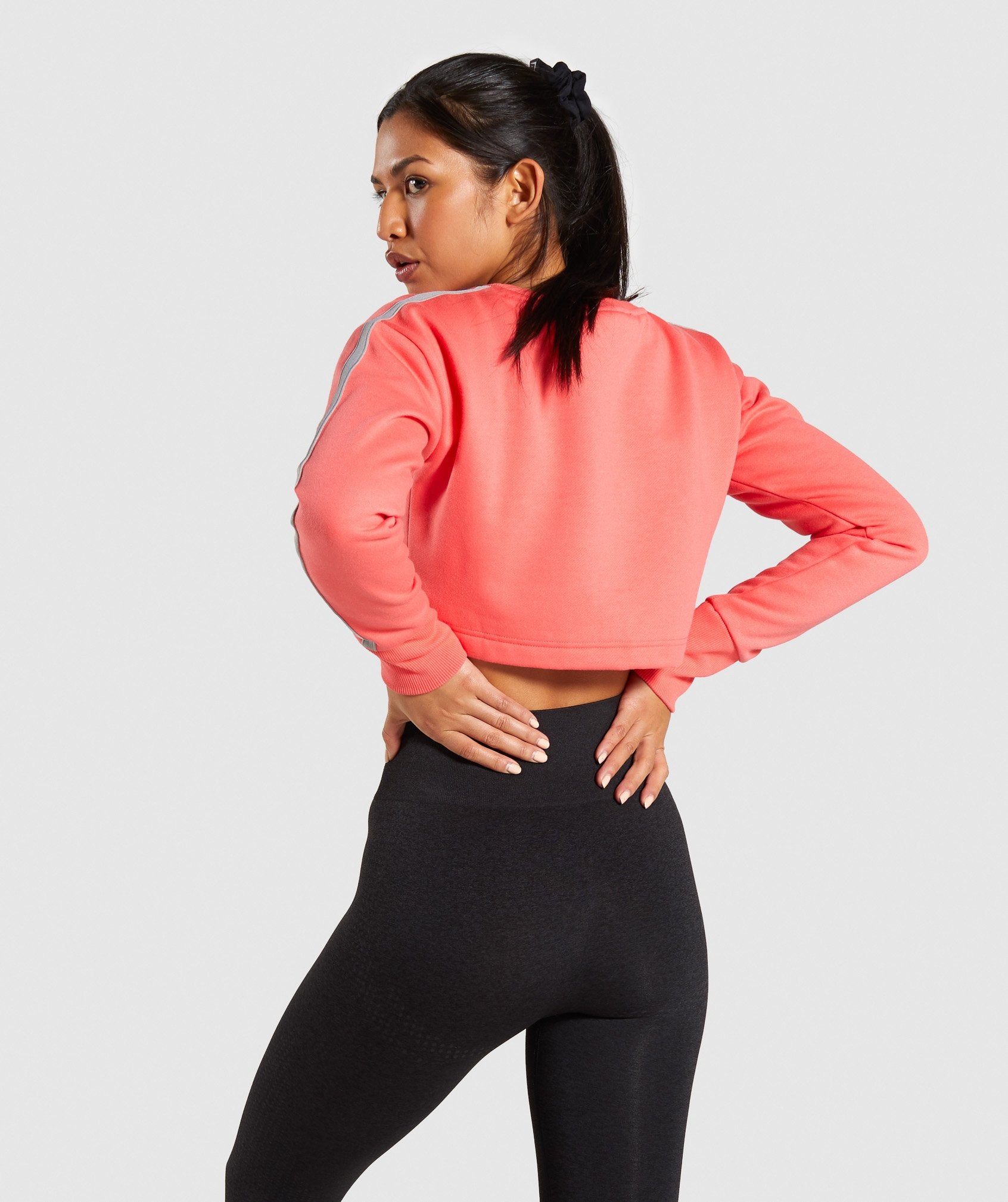Legacy Fitness Sweater in Coral