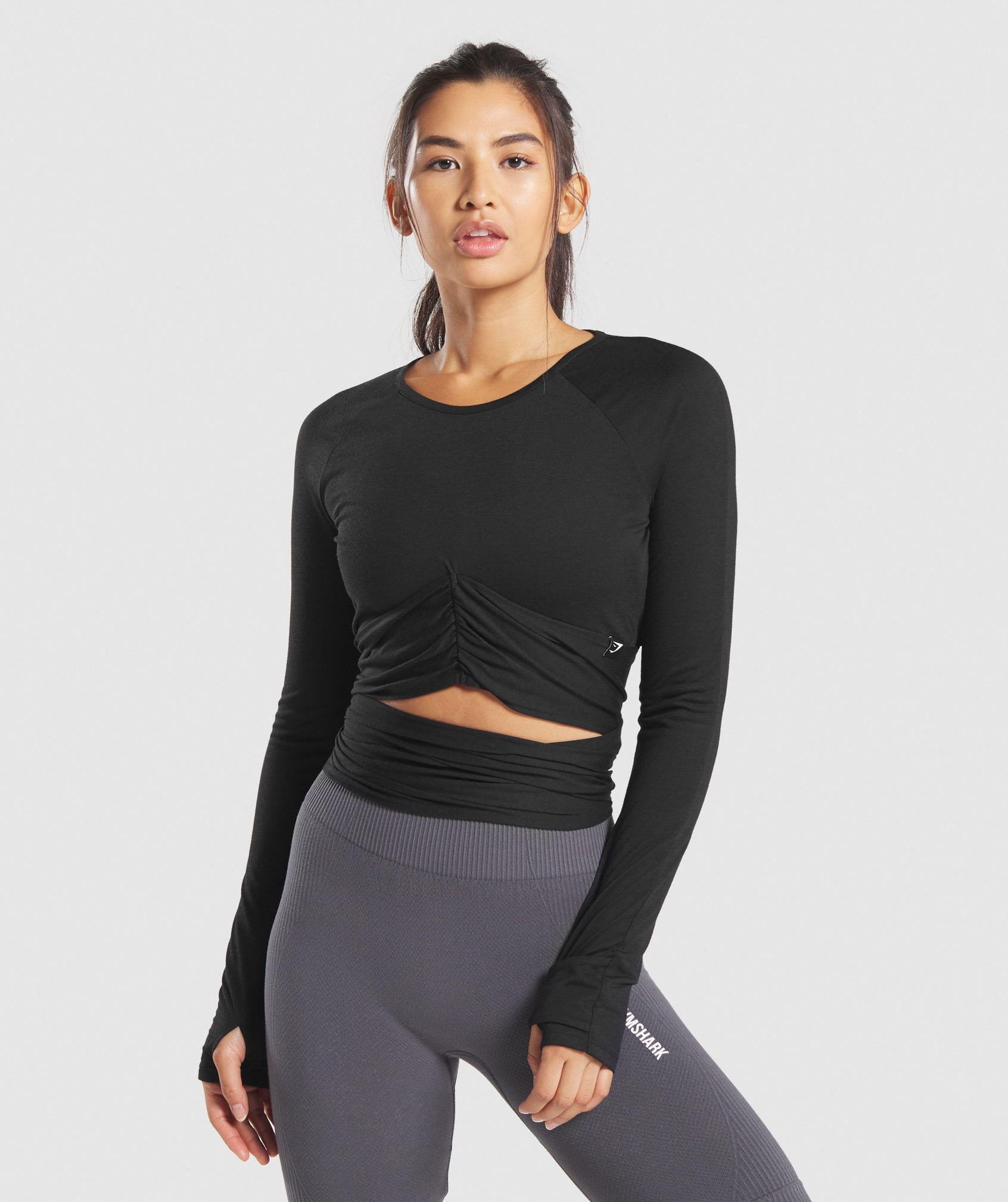 Power Down Long Sleeve Crop Top in  Black