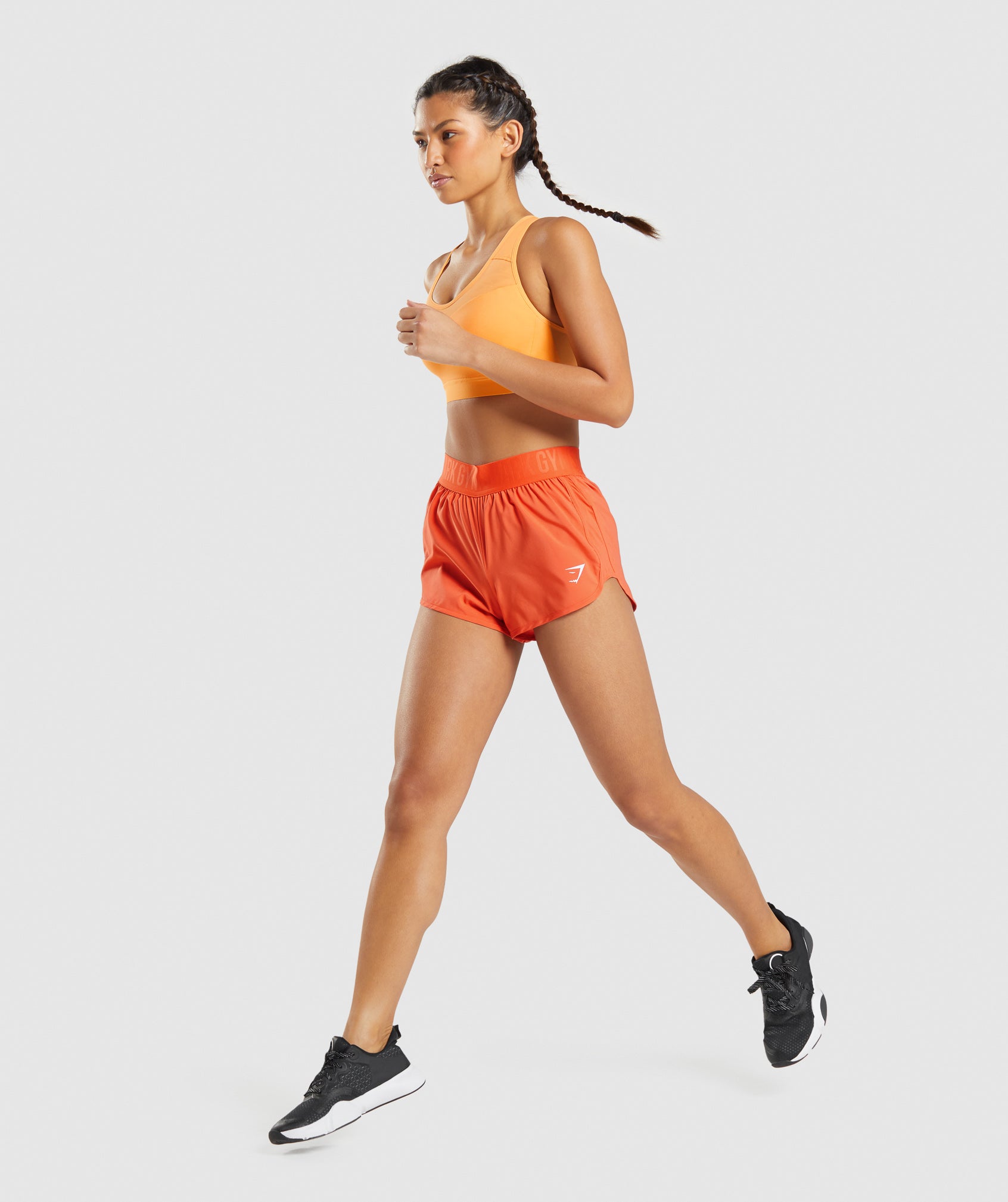 Training Loose Fit Shorts in Papaya Orange - view 4