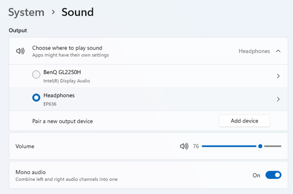 The Windows 11 Sound Settings Menu shows a monitor and connected headphones. The Headphones show a volume and other settings as they are the active device.
