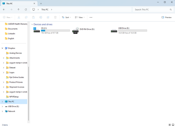 A Windows File Explorer Window Shows 3 Devices in "This PC". An Internal Hard Drive, a DVD Drive and an External USB Drive