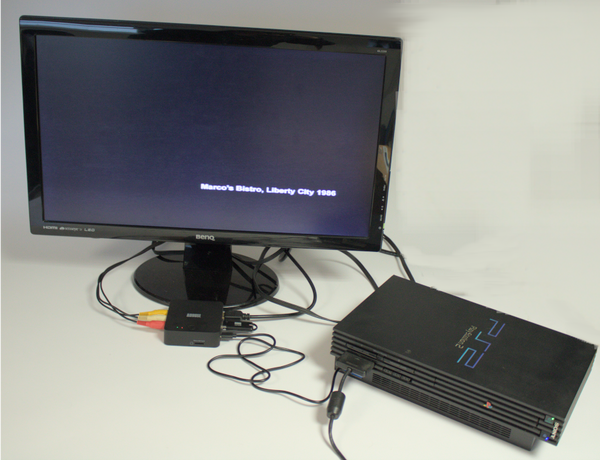 The VGB400 and PS2 connected to a monitor displaying "Marco's Bistro, Liberty City"