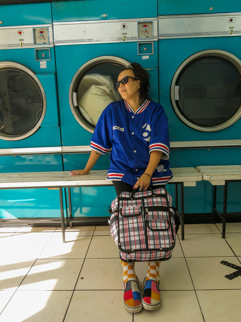 Goodordering laundrette photo shoot with tartan bag range