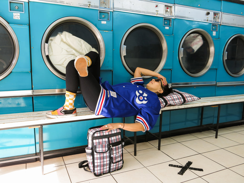 Goodordering laundrette photo shoot with tartan bag range