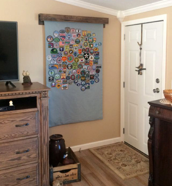 Patches display in house on a cork board