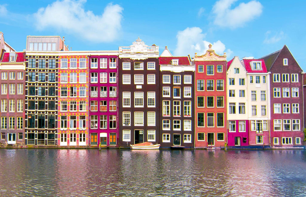 Amsterdam architecture and Damrak canal, Netherlands.