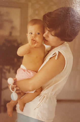 woman holding baby