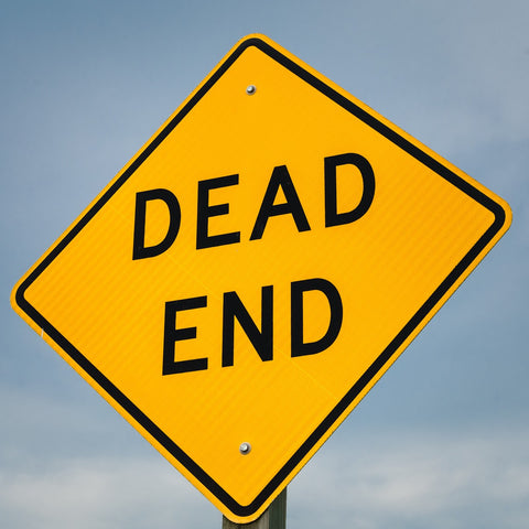 yellow road sign that says "dead end"