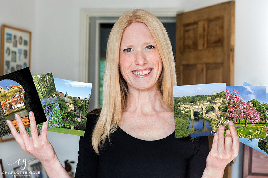 Professional photographer Charlotte Gale with her range of Yorkshire greetings cards