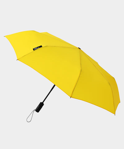 yellow compact umbrella