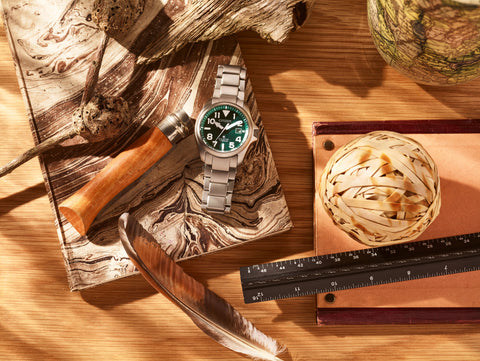 citizen promaster tough on a flatlay background with acessories