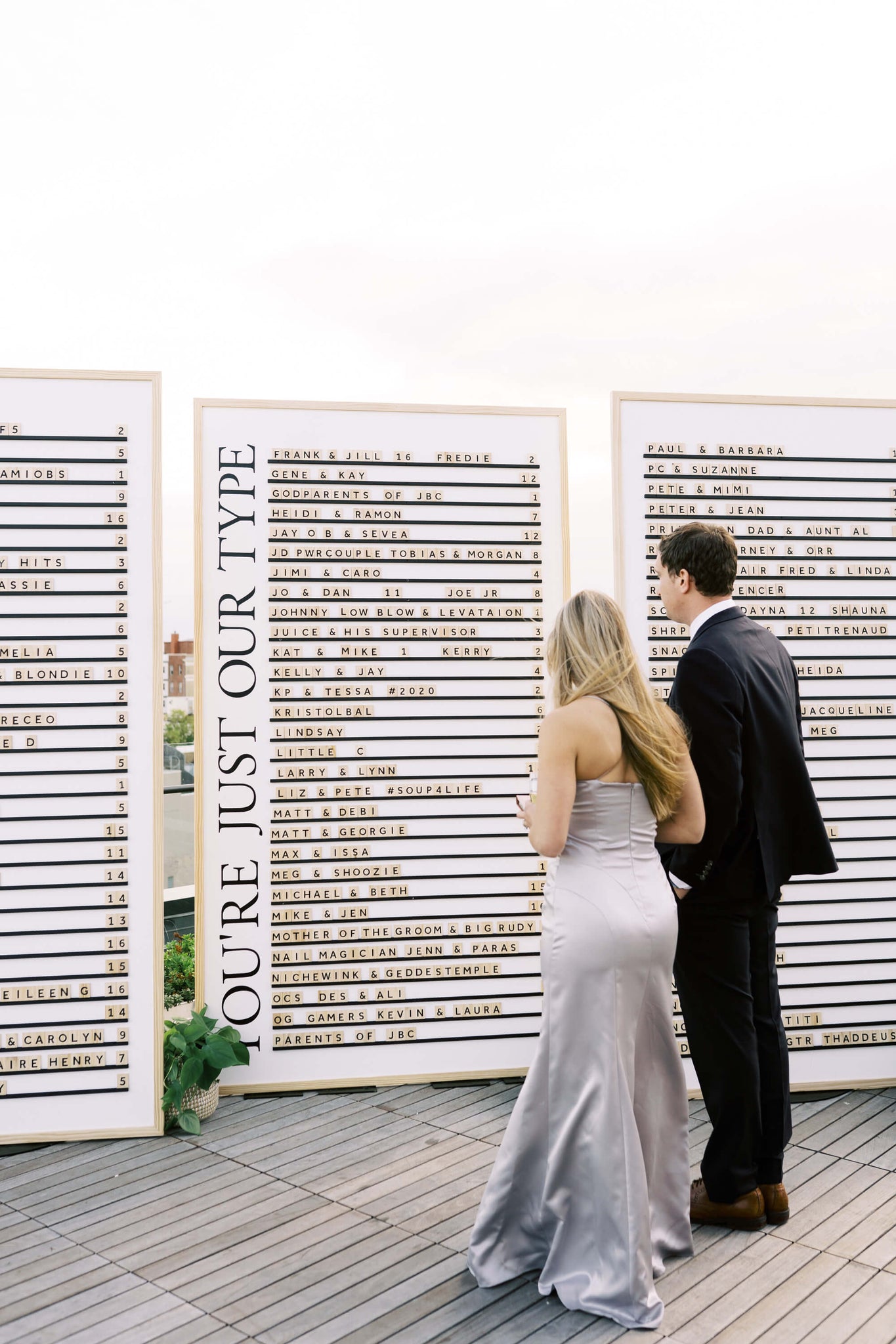George & Will'ys Wooden Letter Board displaying a wedding seating plan