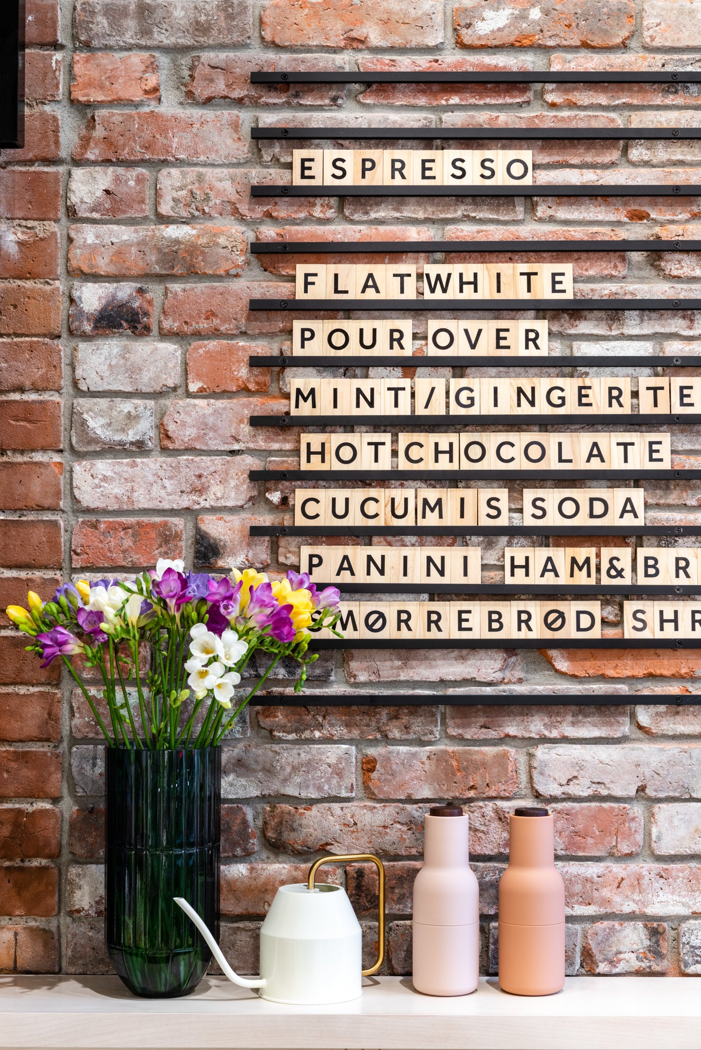Wooden Letter Board On Brick Wall For A Cafe Menu