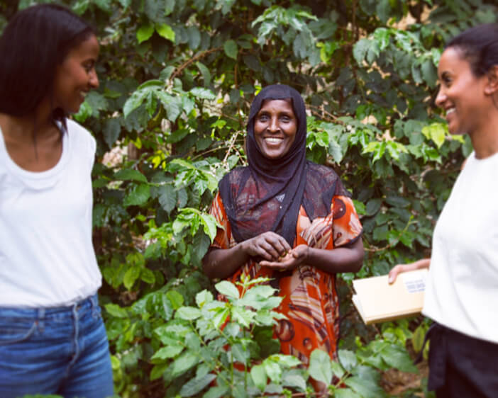 sali and sara nuru with an ethiopian woman