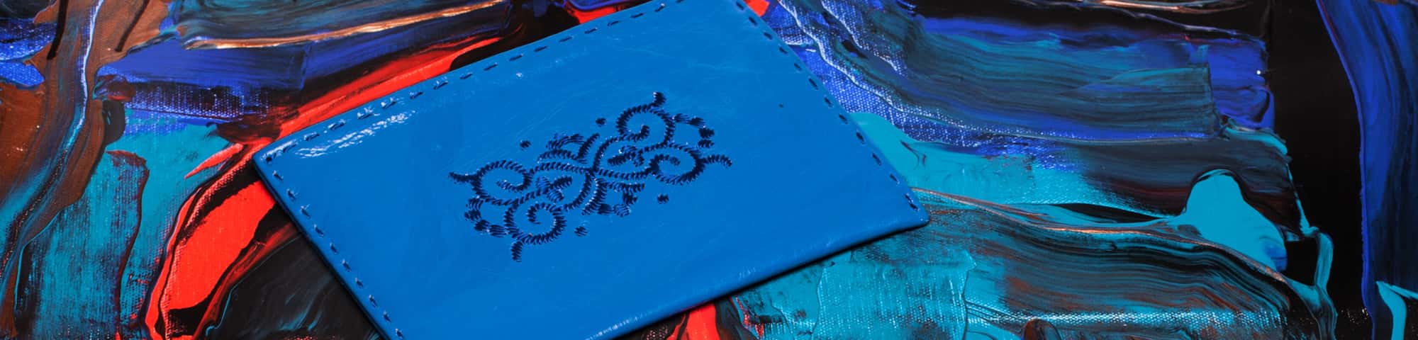 blue embroidered leather pouch by ABURY