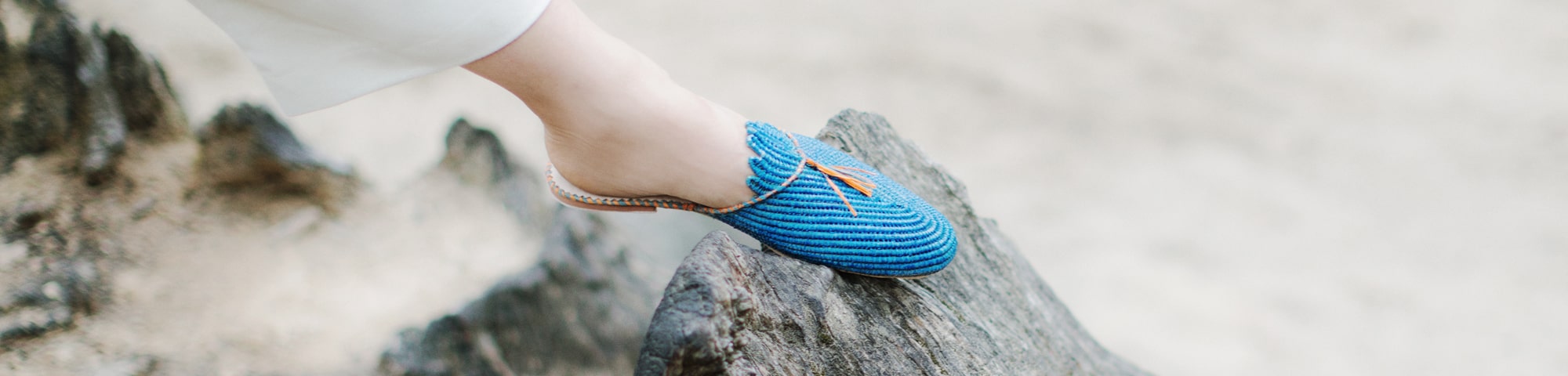 ABURY handmade raffia shoes in blue with pompom