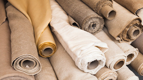 A Close-Up View of Several Rolls of Fabric