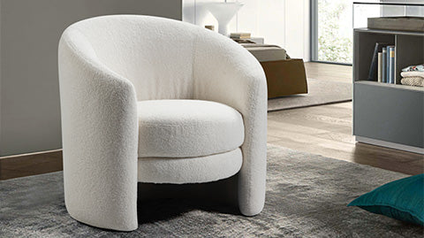 In a Living Room, Left-Angled Front View of A Luxurious, Cream White, Carla Accent Single Chair.