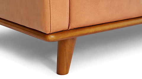 Wooden Leg Close-Up View of A Modern, Cognac, Loveseat, Leather Artisan Sofa.
