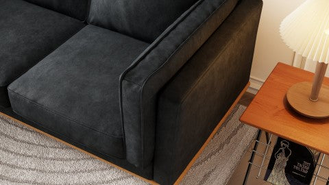 Left-Side, Half Armrest & Half Seat Close-Up View of A Modern, Black, Three Seats, Leather Artisan Sofa