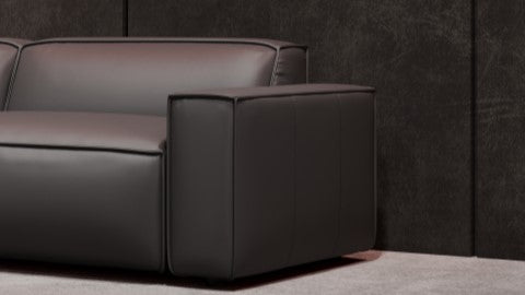 Right-Side, Armrest and Seat Close-Up View of Modern, Black, Five Seats, Full Aniline Top Grain Leather Modular Sofa on a White Background.