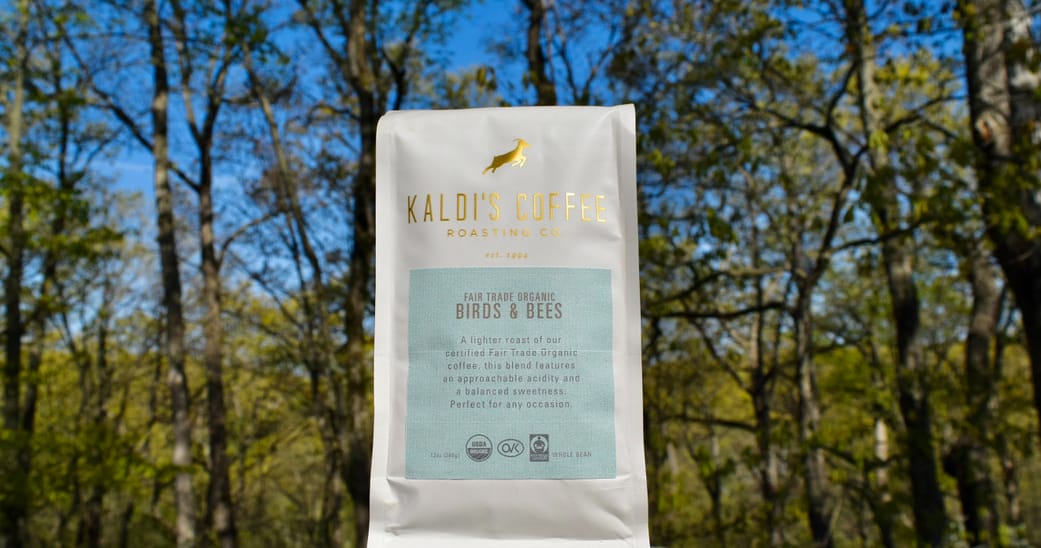 Birds & Bees coffee blend bag in front of trees