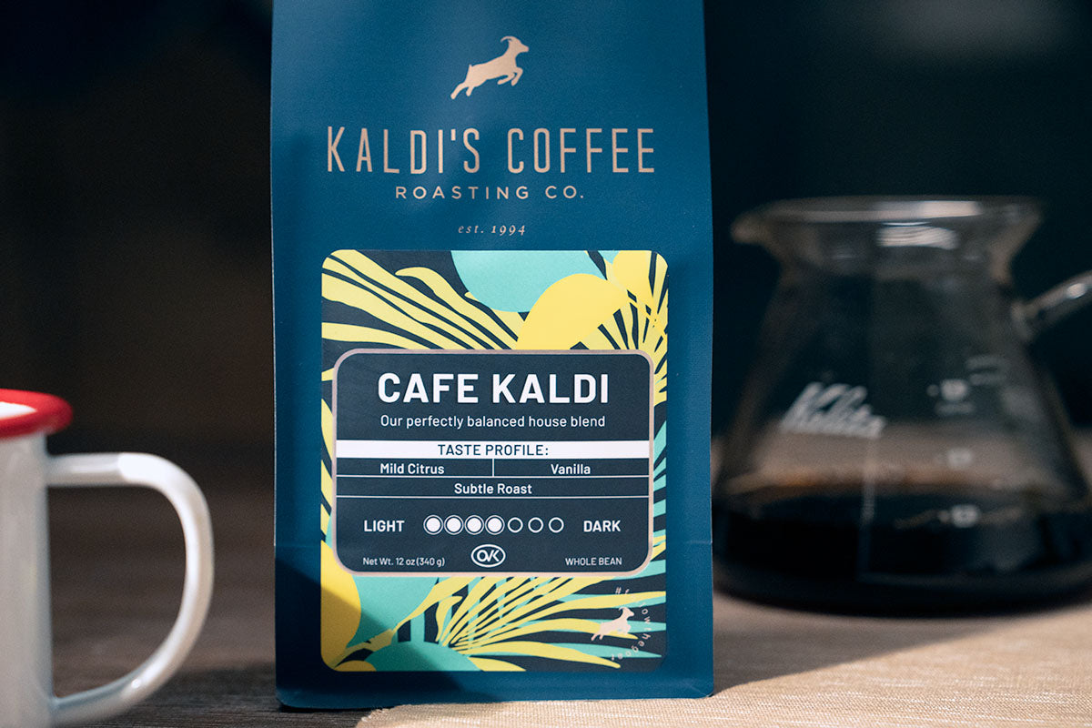 A 12oz bag of Cafe Kaldi and a coffee carafe