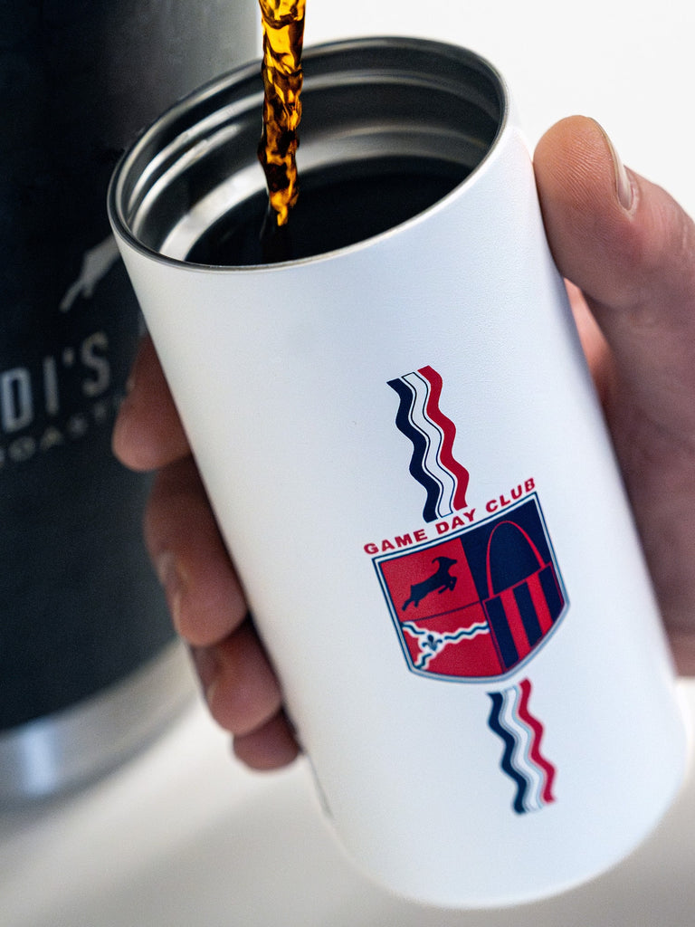 Game Day Tumbler v3 being filled with coffee from an airpot
