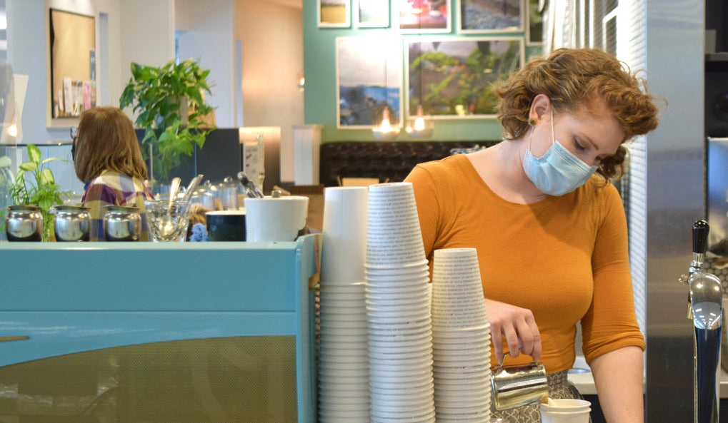 Lauren pouring a latte drink