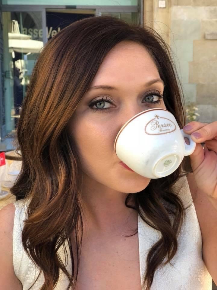 Lyndsey drinking espresso in Italy