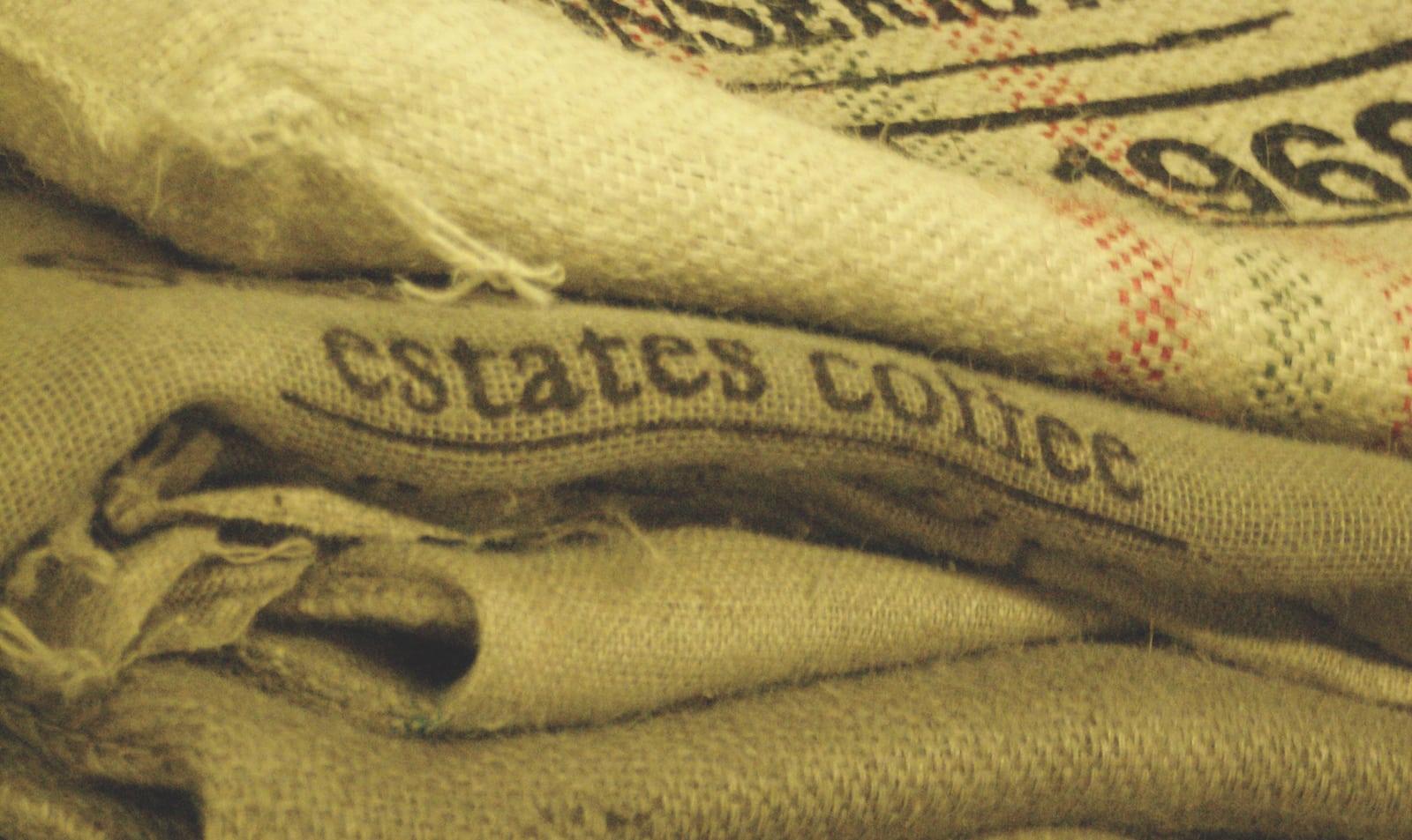Burlap coffee bags stacked