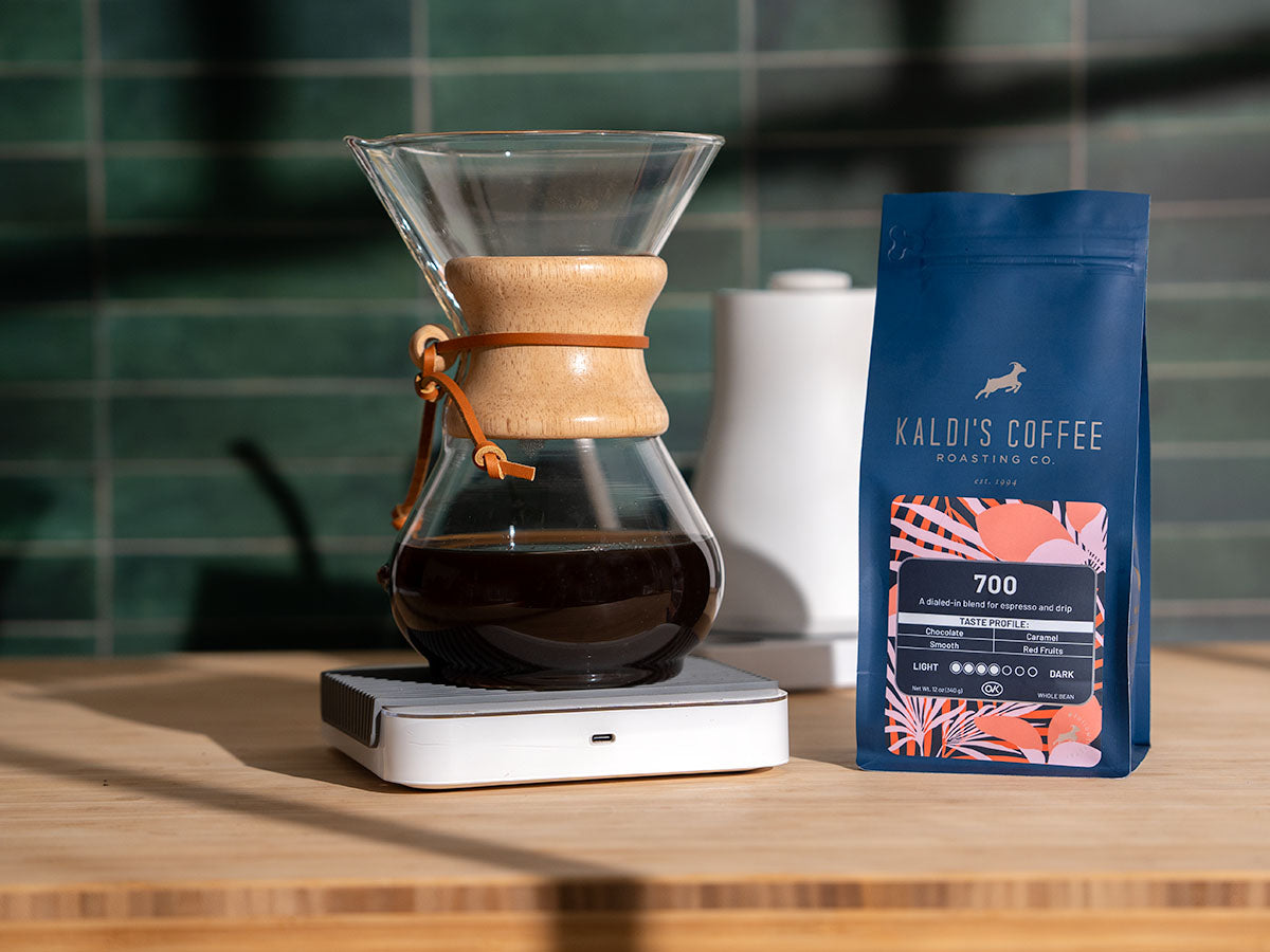 A chemex sits with a 12oz bag of 700