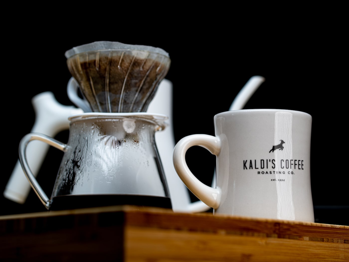 Completed brew on the V60 next to a Kaldi's Coffee Diner Mug