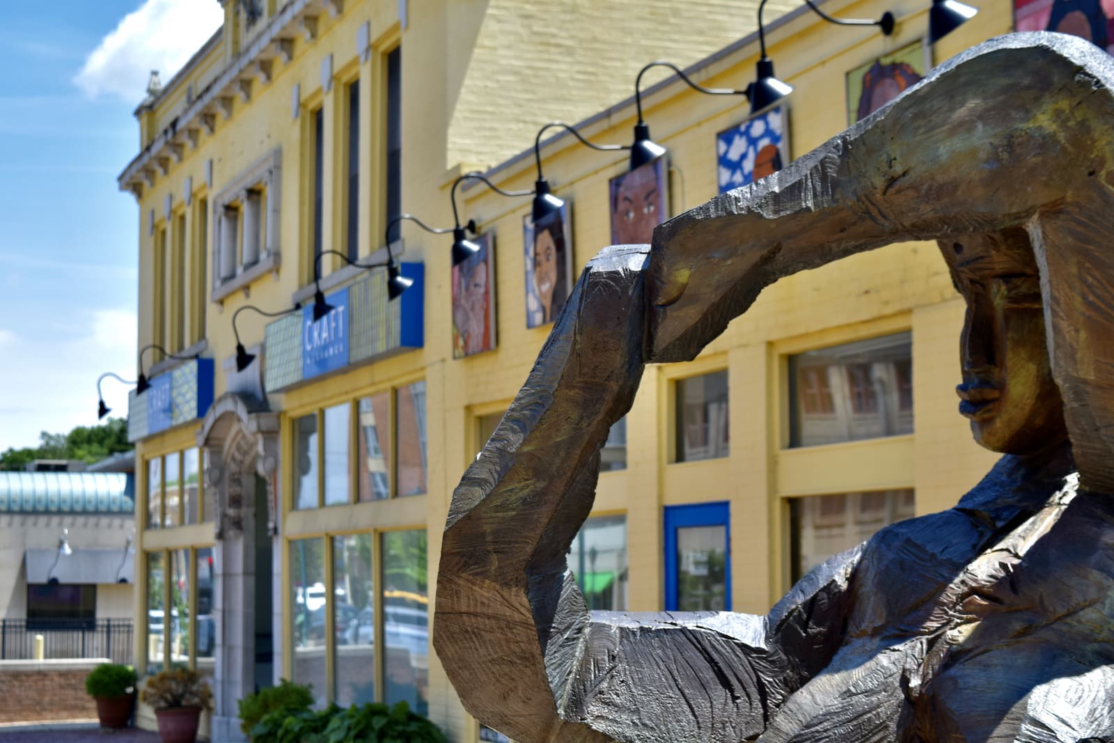 Craft Alliance Sign and Statue in the Delmar Loop in St. Louis, MO