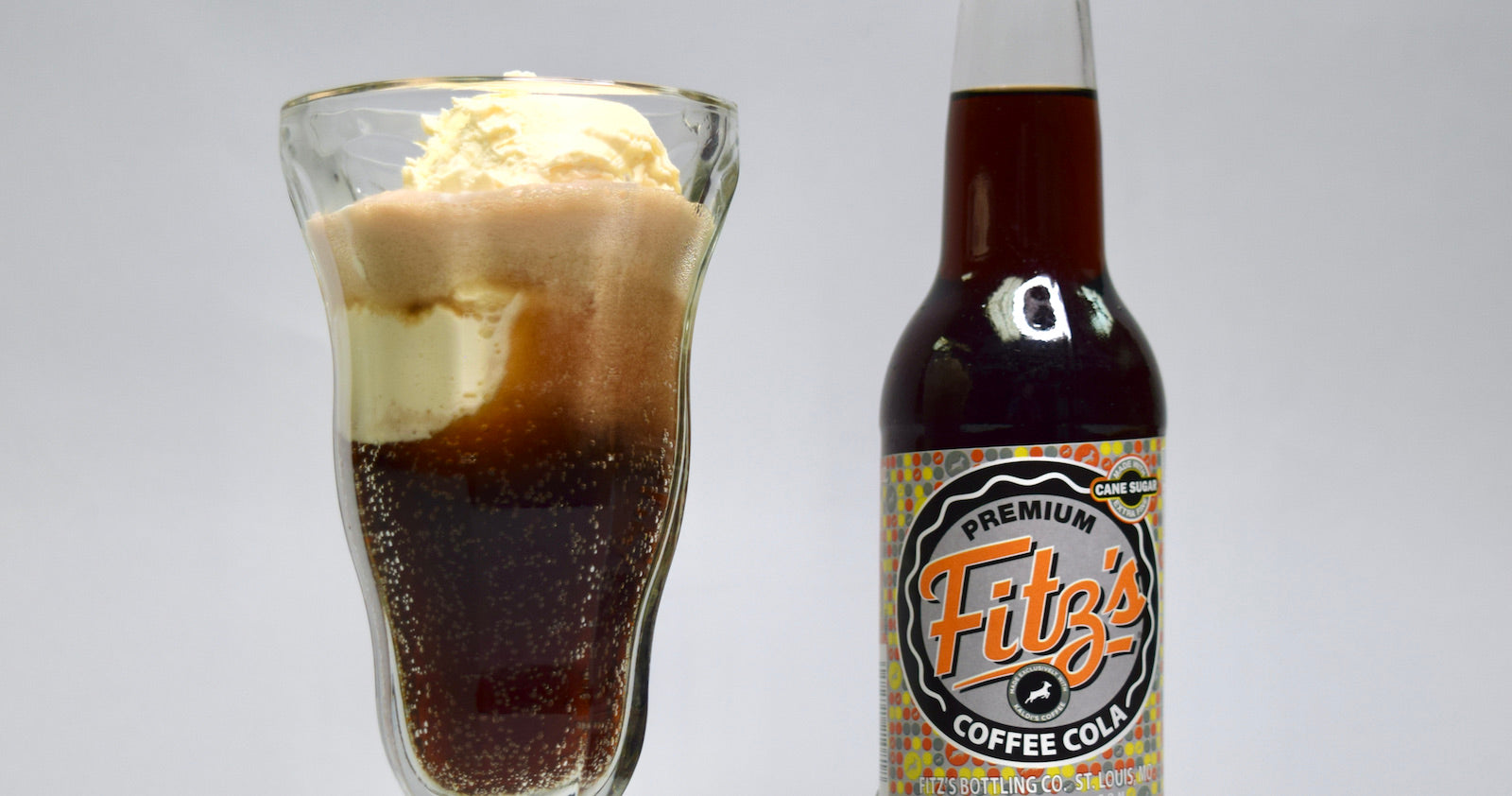 Bottle of Fitz's Coffee Cola next to a prepared coffee cola float