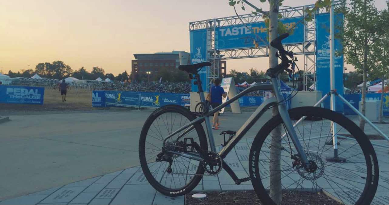 Bike in front of pedal the cause finish line