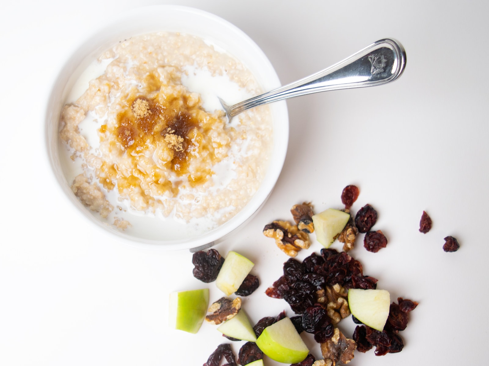 Bowl of oatmeal with fruits and nuts