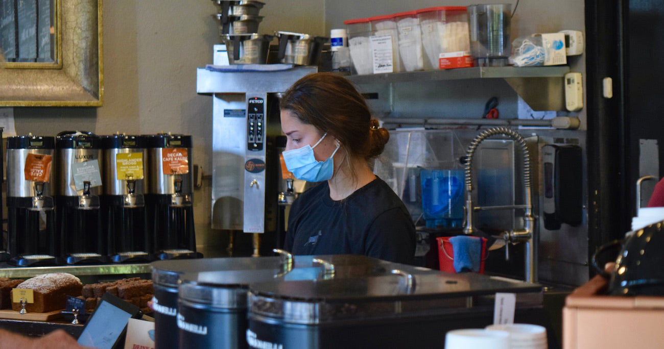 Paige working inside of the Kaldi's Coffee on Demun coffee shop